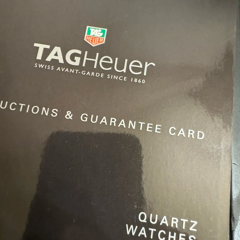 Tag Heuer Watch with original box, travel case, brocures